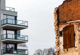 New Apartment Next To Crumbling Building